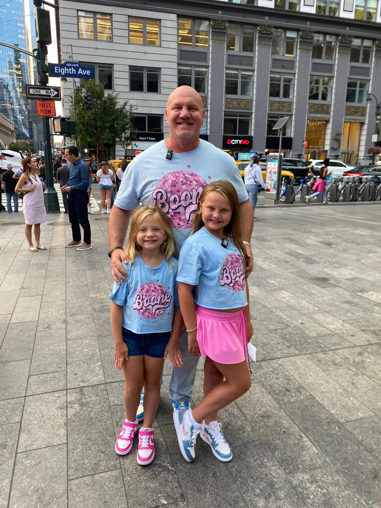 Andrew-with-his-daughters